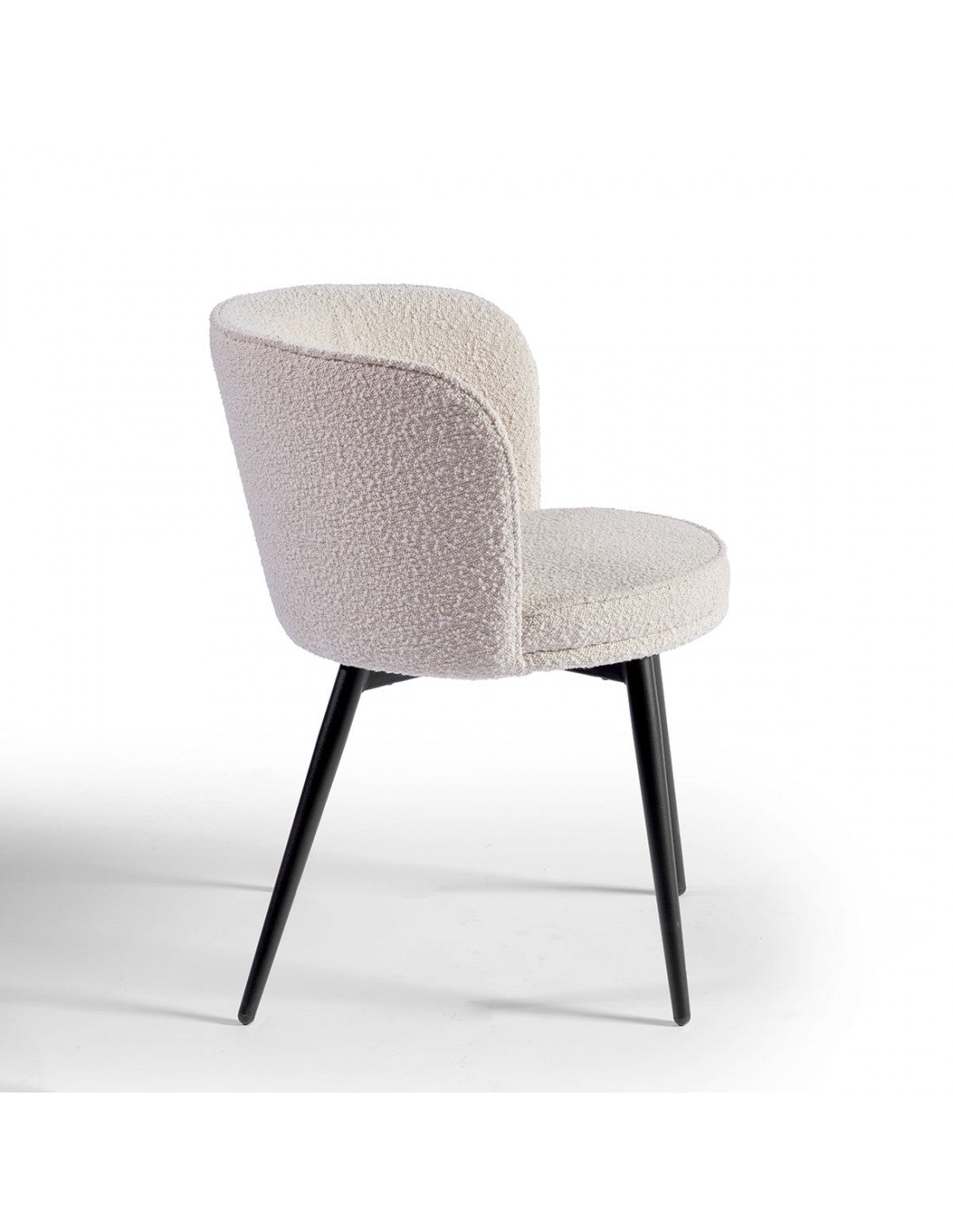 Rounded sand and black metal upholstered chair