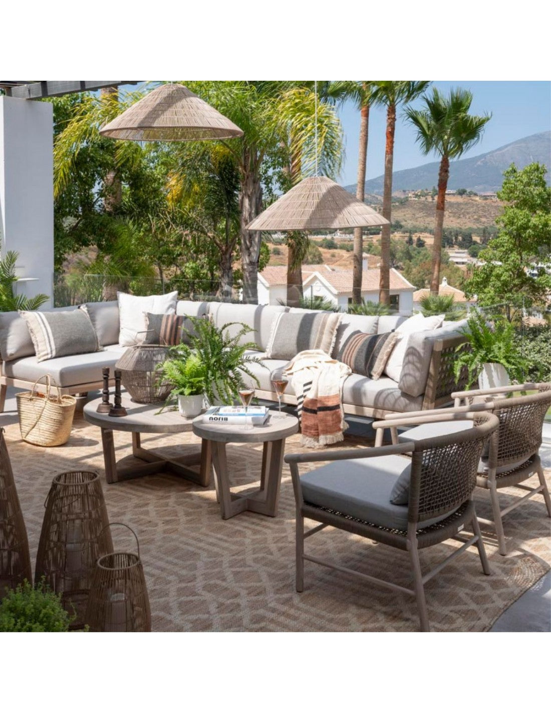 Round teak and rope outdoor armchair