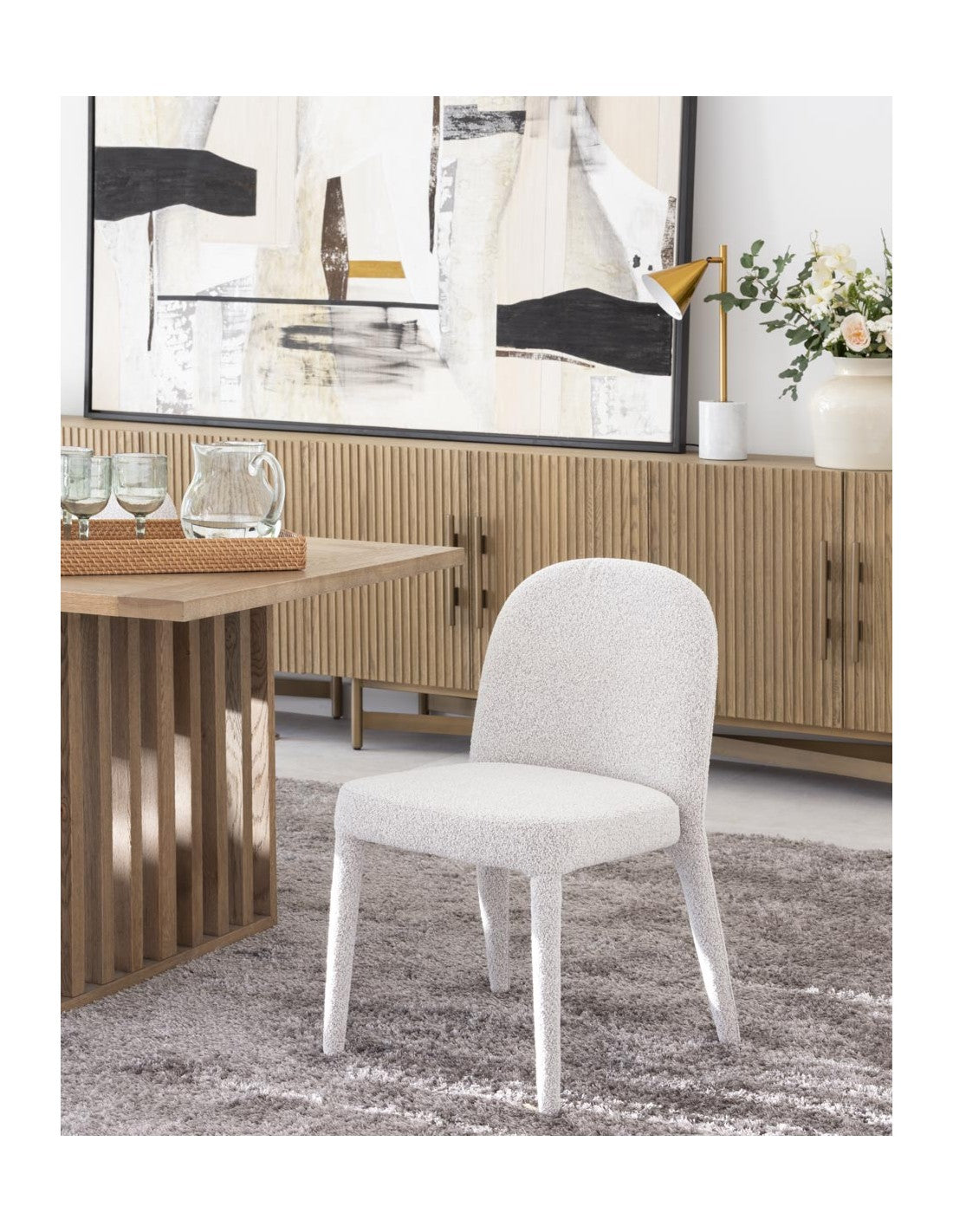 Silla tapizada bouclé grisáceo