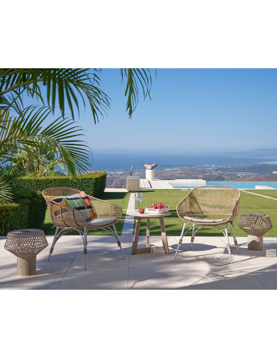 Synthetic rattan armchair under natural color