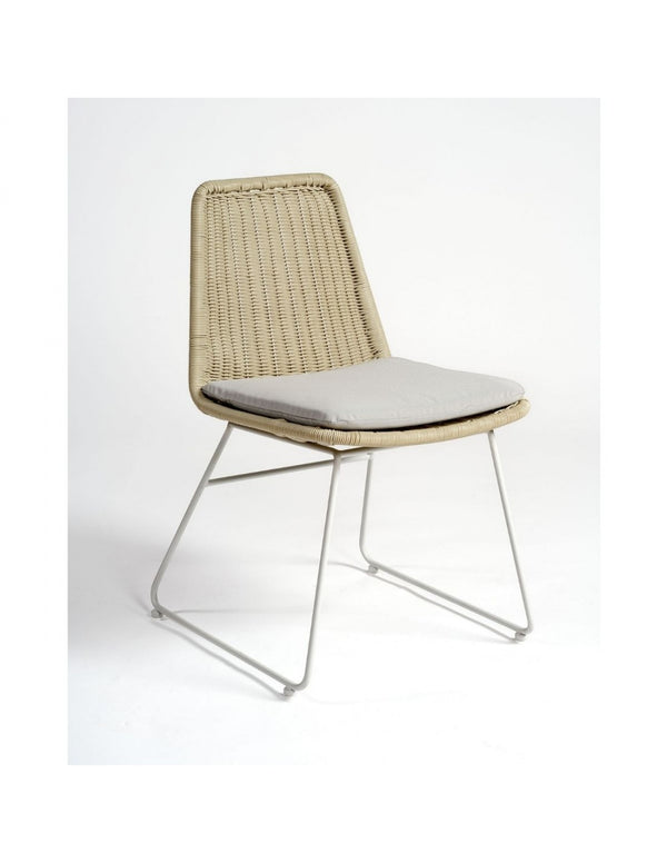 Chalk-colored synthetic rattan chair with white leg...