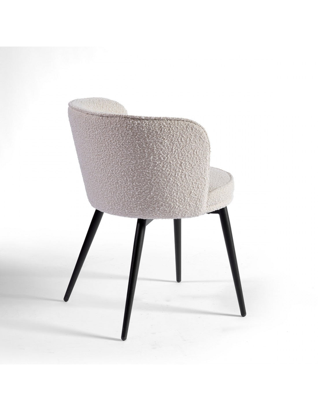 Rounded sand and black metal upholstered chair