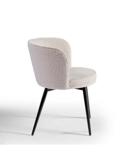 Rounded sand and black metal upholstered chair