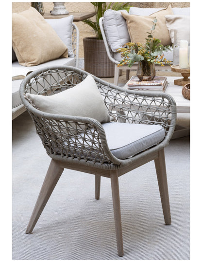 Cement-colored wood and rope armchair