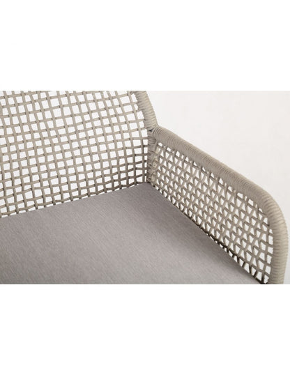 Grayish white rope and metal armchair
