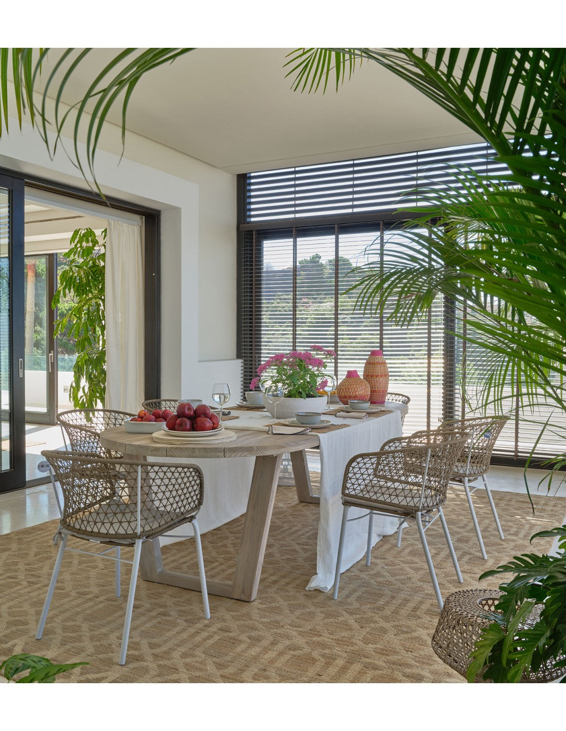 Oval wooden outdoor table with wooden legs