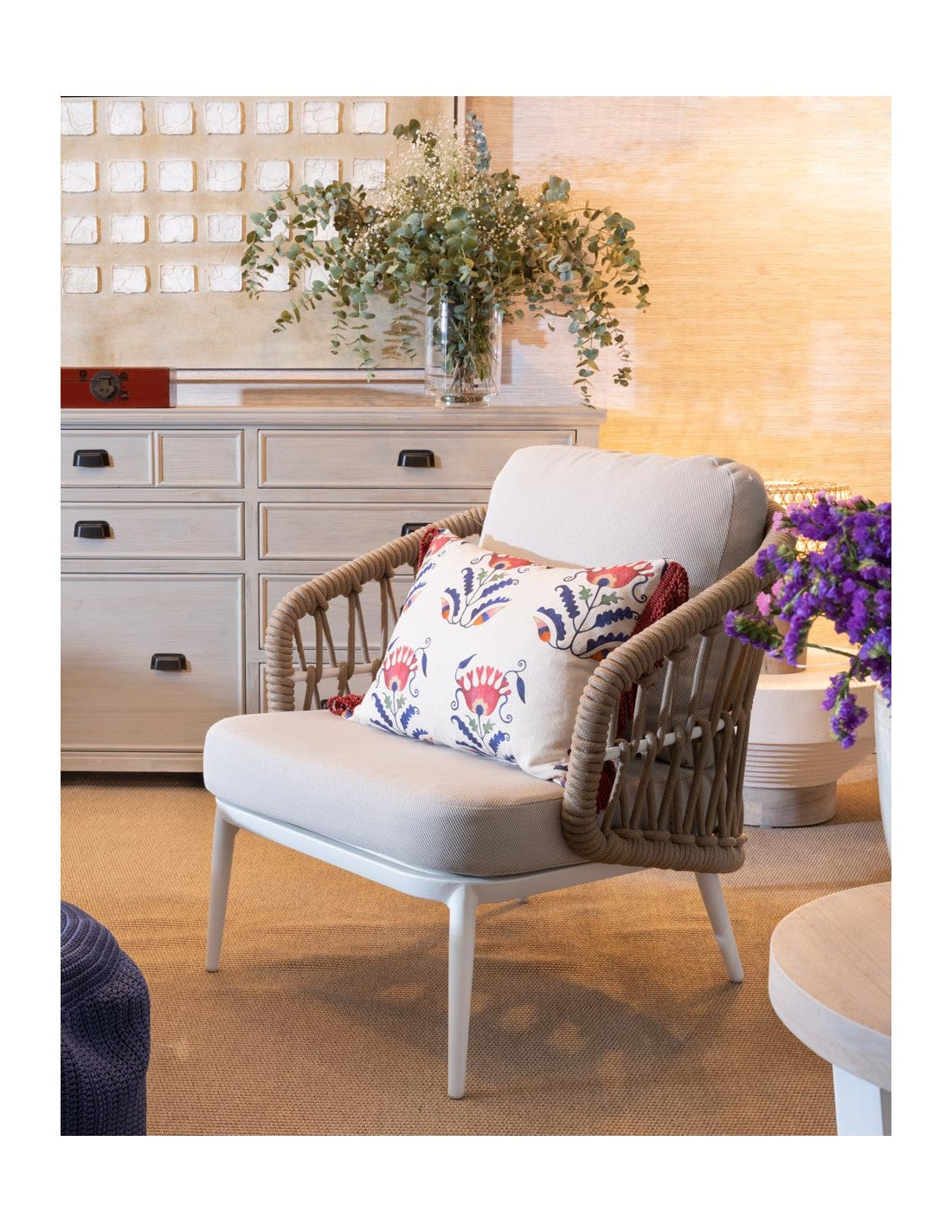 White aluminum armchair and natural rope