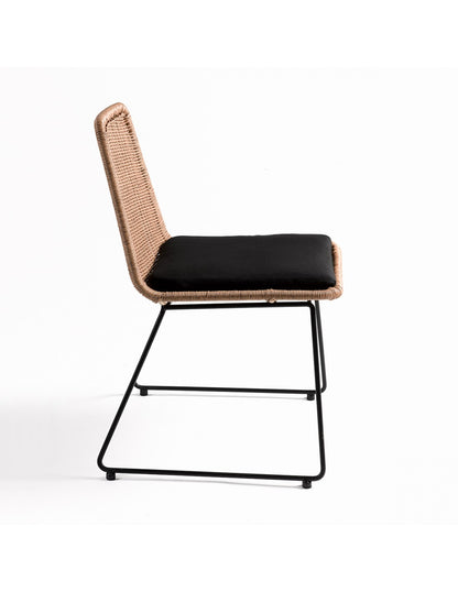 Synthetic rattan chair with black legs