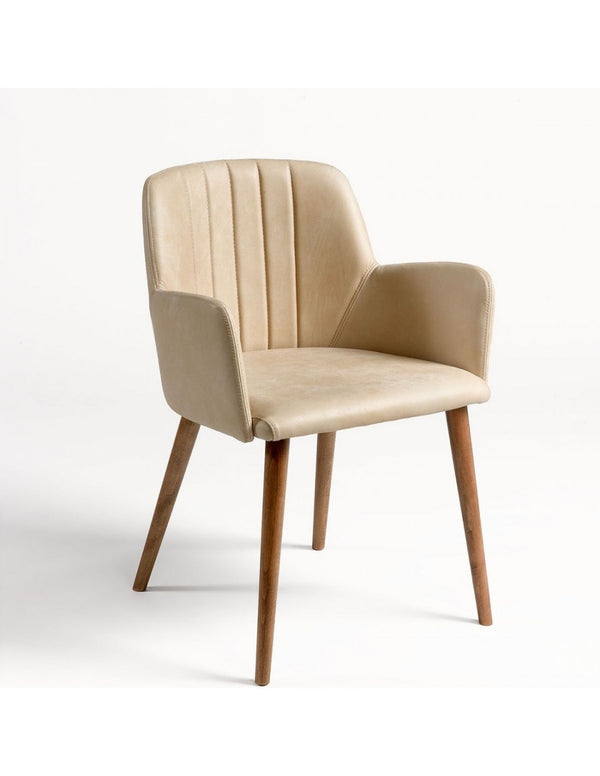 Beige leather armchair and wooden leg